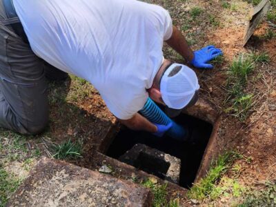 Holding Hose In Sewer